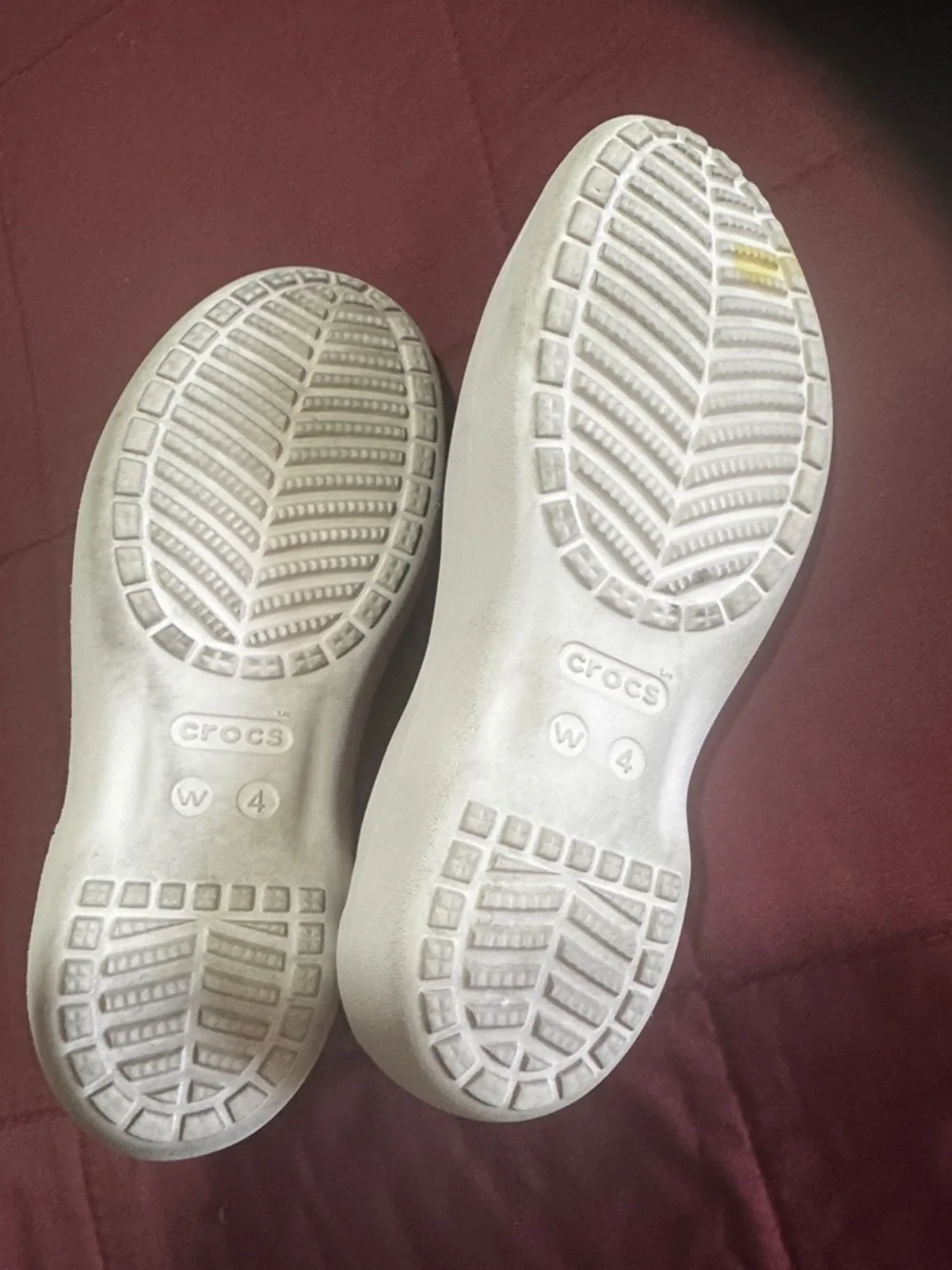 CROCS kids pink Slip-On Ballet Flats they have a little stain on left shoe